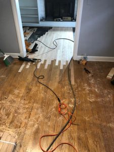 Repair and Refinish matching new flooring to old flooring